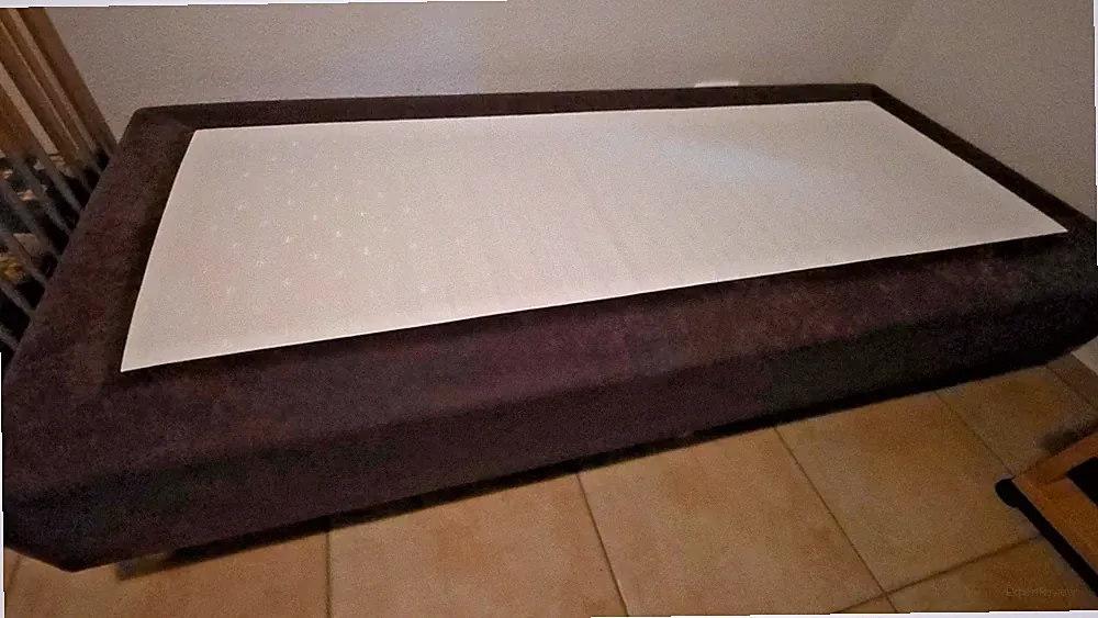 Boxspringbett 90 x 200 mit Matratze, Kopfende mit Rollen, braun