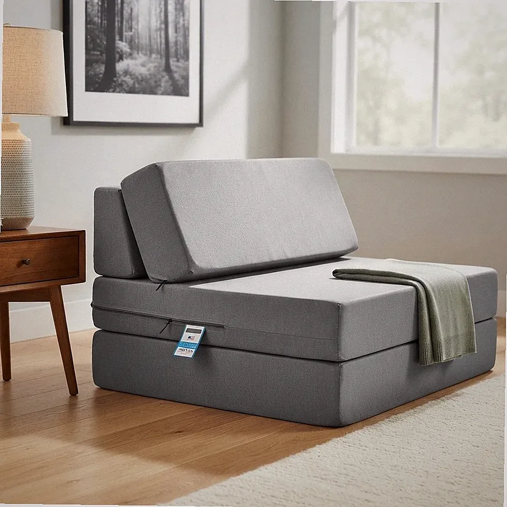 Grauer Futon-Sofabettsessel mit zwei Verwendungsmöglichkeiten - stilvoll und funktional für jeden Raum