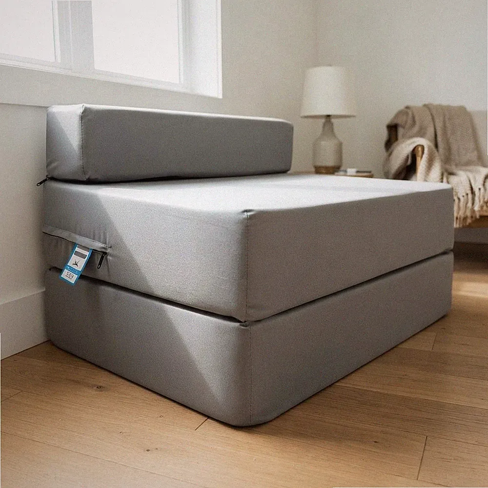 Kompaktes & tragbares graues Futon-Schlafsofa - perfekt für kleine Räume und Entspannung